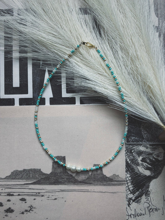 Golden pearl necklace