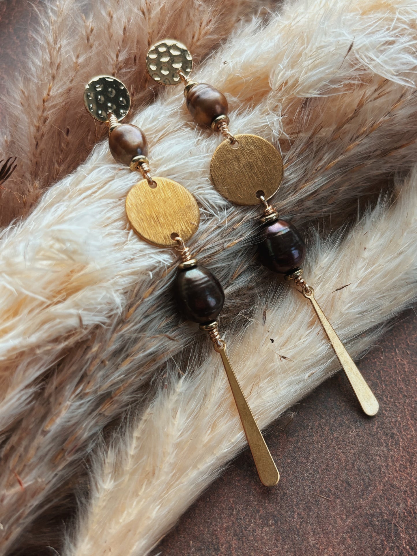 A pair of Brown freshwater Pearl Earrings with 14K gold findings